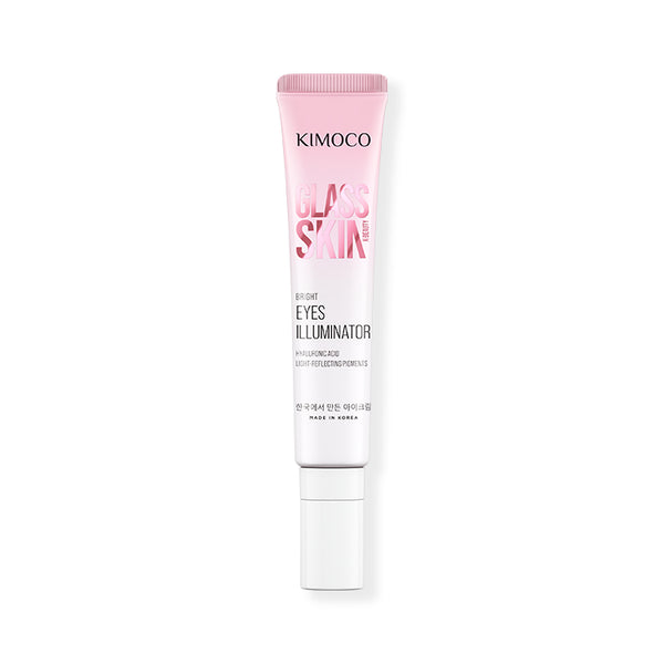 Po środku pionowo ustawiona tuba "Kimoco Glass Skin Bright Eyes Illuminator" z zamkniętą białą zakrętką, na białym tle.